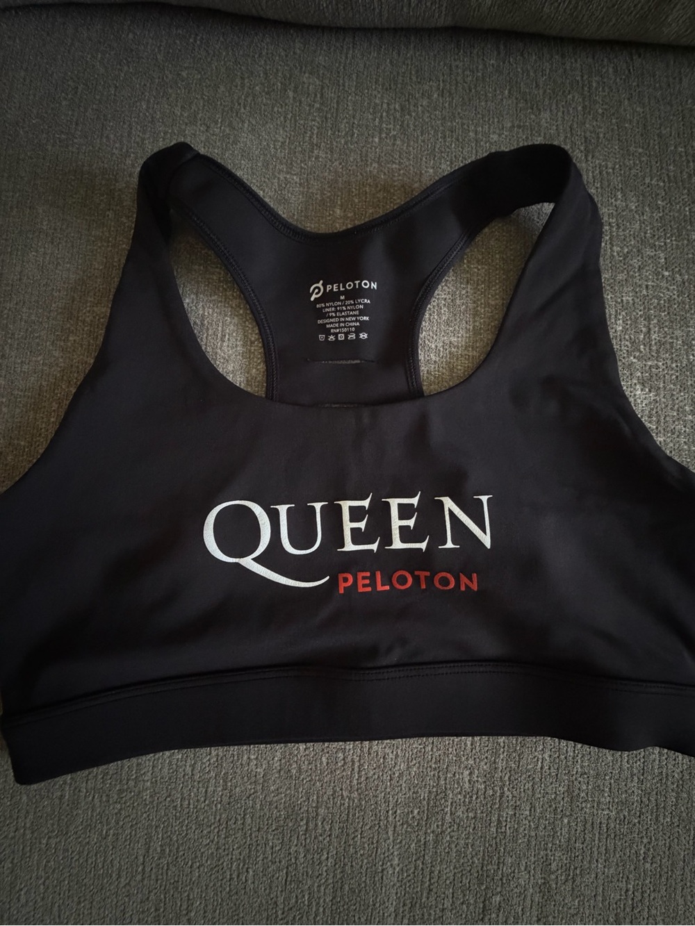 Peloton Black Sports Bra with WHITE "QUEEN" and RED Peloton Logo